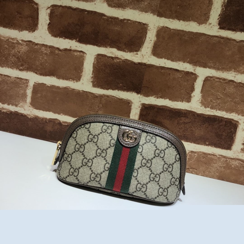 G*u*i clutch bags
